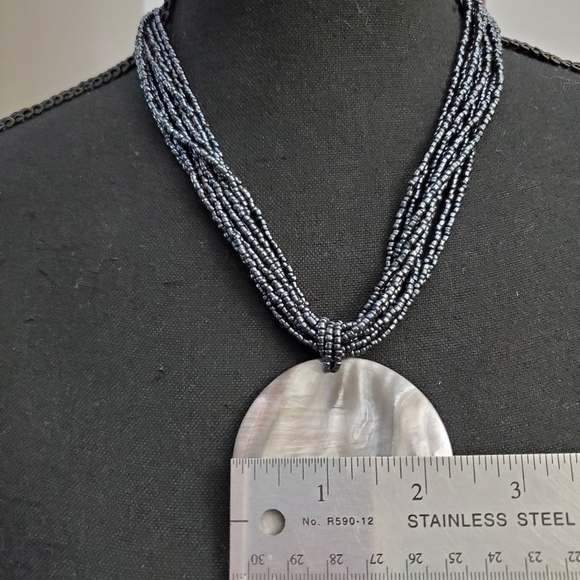 Handmade Multi-Strand Seed Bead Necklace with Large Round Shell Enhancer - Picture 3 of 3